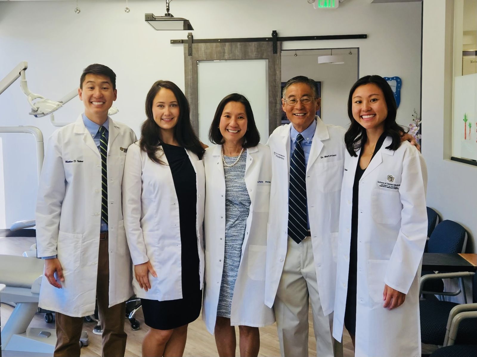 Iritani Family in White Coats with Dr. Dinkel